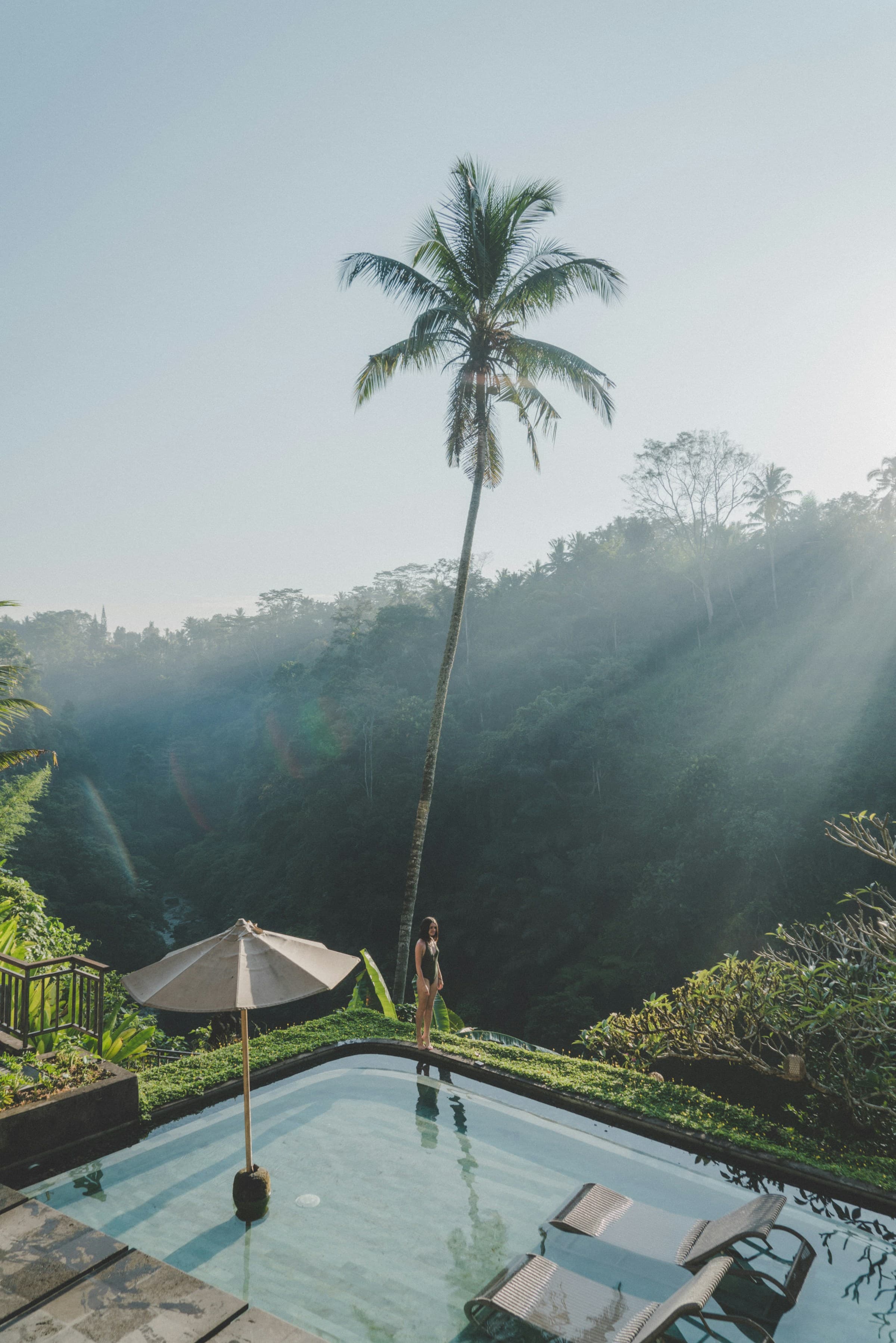 Villa pool terrace looking out over a jungle valley in the morning